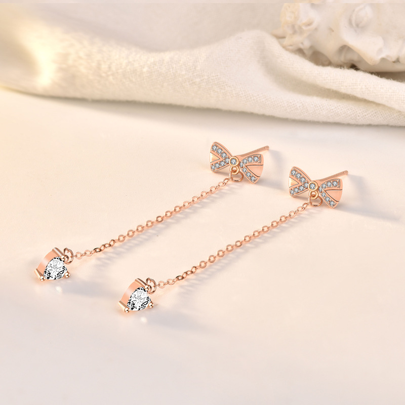 Clous d'oreilles en argent, nœud et pompon – Image 4
