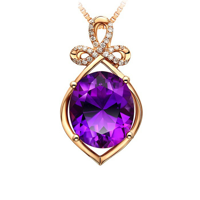 Necklace with a purple stone, gold coloured