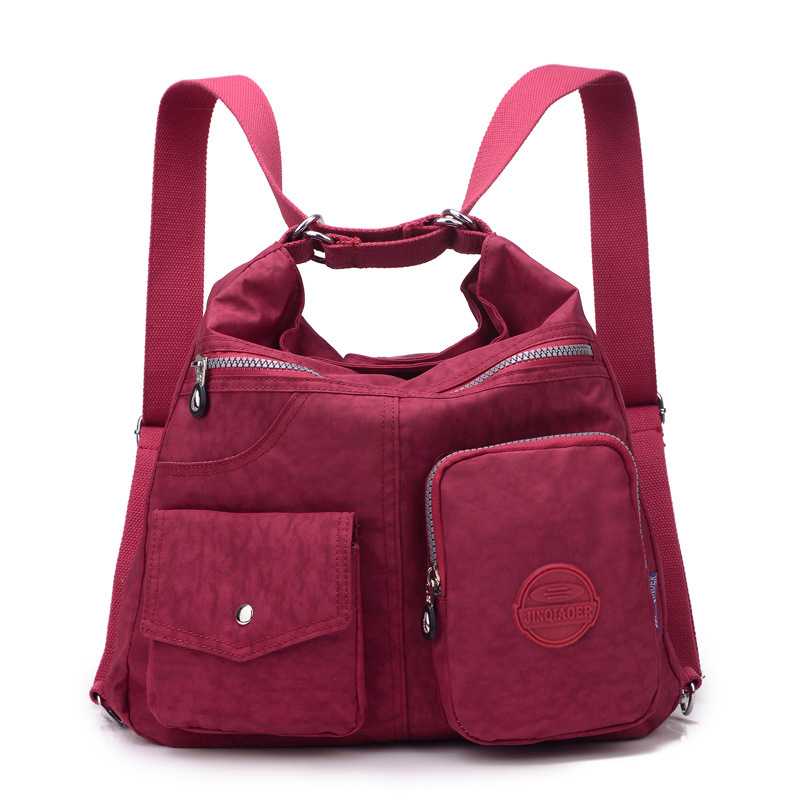 Nylon shoulder bag with zip and inner pockets, grape purple