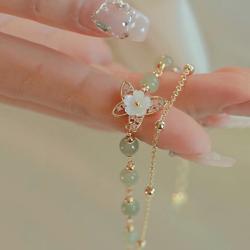 Butterfly and flower bracelet, gold tone - Image 3