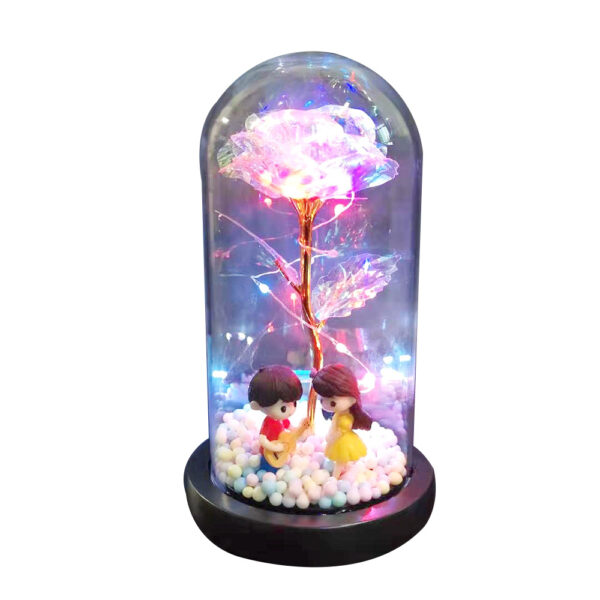 Rose under a glass dome with lights