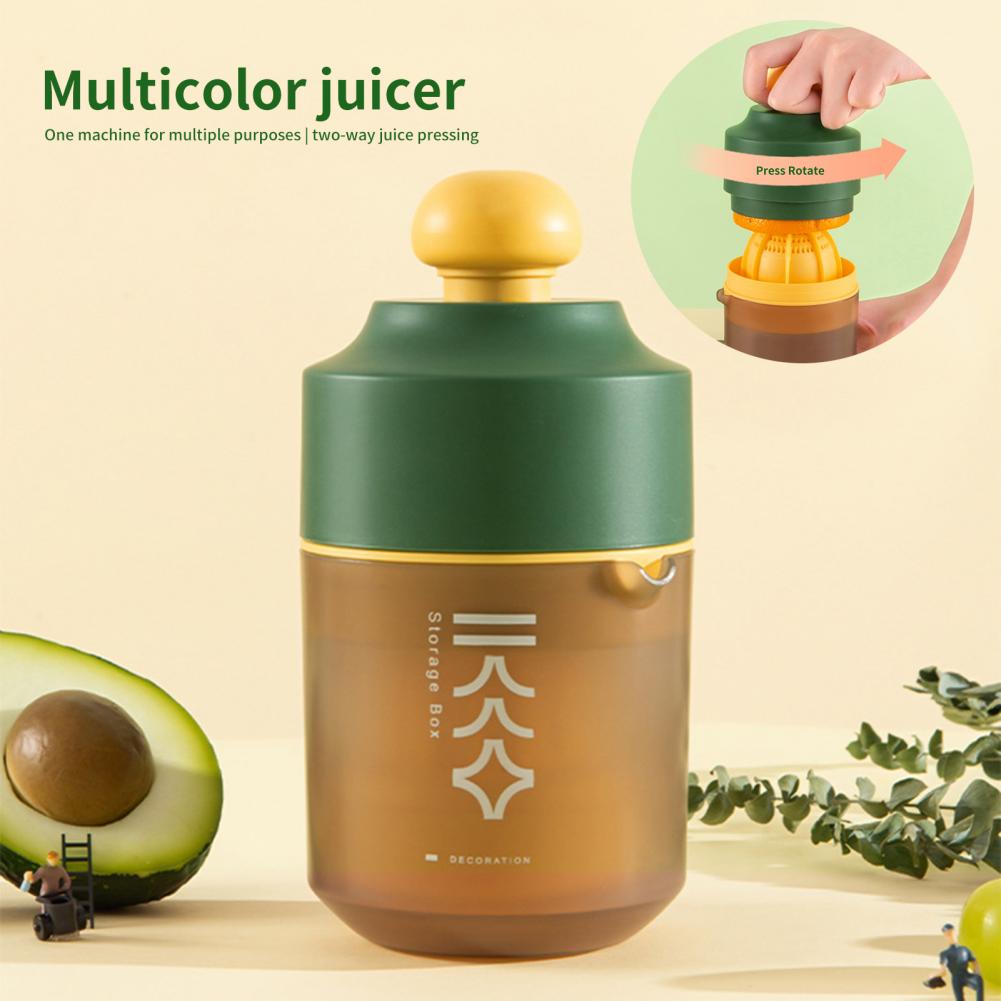 Presse-agrumes manuel avec bouteille, vert
